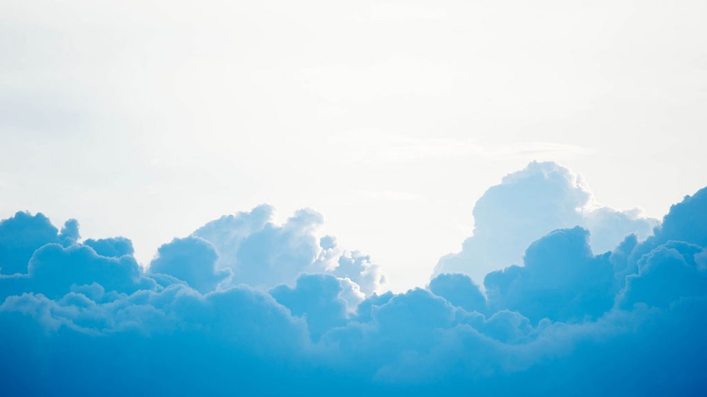 Fluffy blue and white clouds