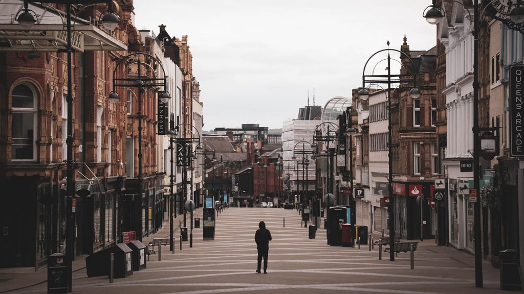 Man walks alone down Leeds high-street