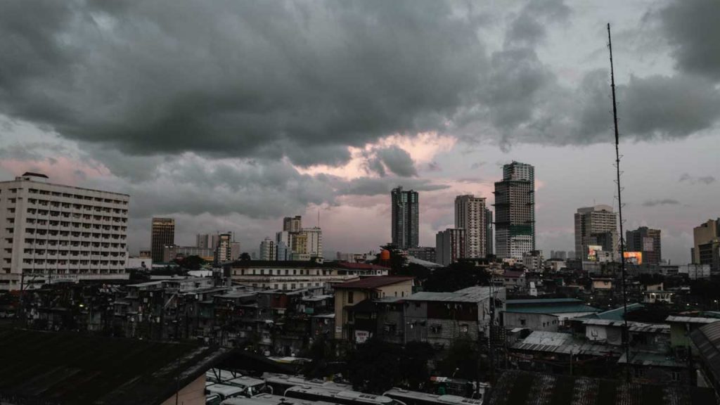Dark storm clouds form over city skyline in Manilla