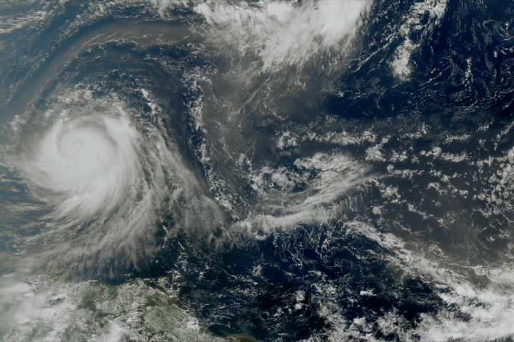 Satellite image of a large storm swirling over the ocean