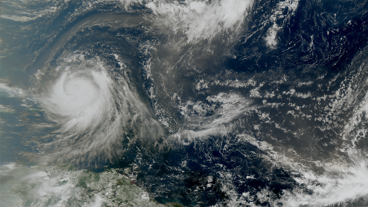 Satellite image of a large storm swirling over the ocean