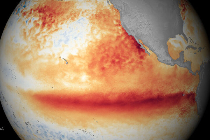 Scientific modelled image of the Earth, showing a warm orange and red coloured horizontal band across the Pacific Ocean.
